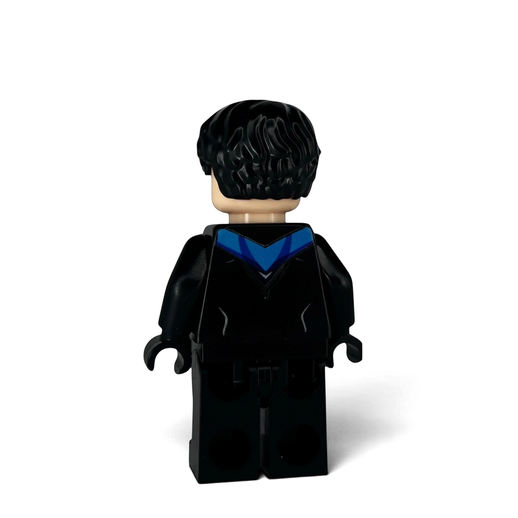 Side view of custom Nightwing LEGO minifigure, UV-printed on genuine LEGO parts by MW Minifigs