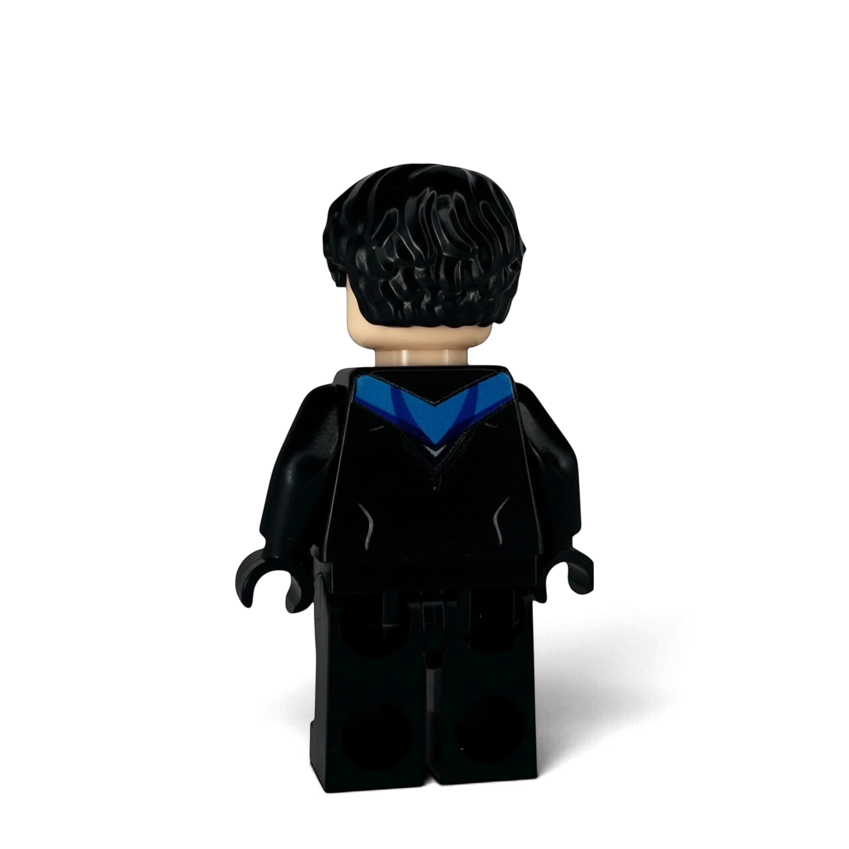 Side view of custom Nightwing LEGO minifigure, UV-printed on genuine LEGO parts by MW Minifigs